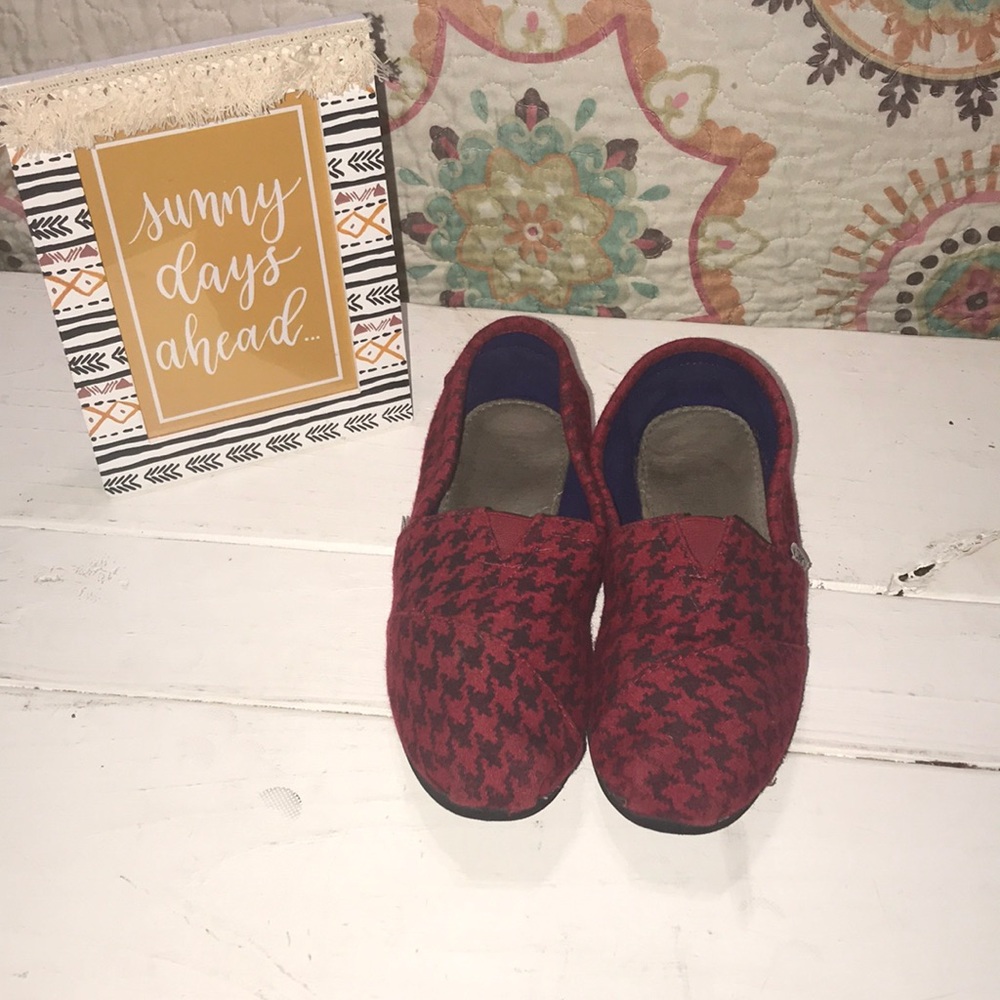 TOMS red and black buffalo plaid slides.